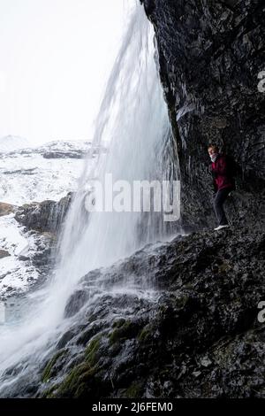 Photograph of Skœtafoss, a remote waterfall in eastern Iceland on an overcast day. Stock Photo