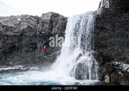 Photograph of Skœtafoss, a remote waterfall in eastern Iceland on an overcast day. Stock Photo