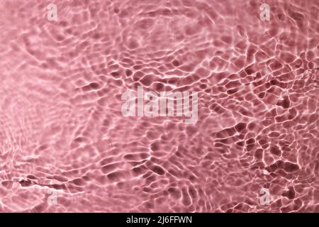 pink clear water surface texture. abstract background Stock Photo