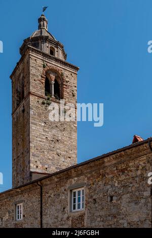 The bell tower of the ancient Pieve di San Giovanni Battista in the historic center of Buti, Pisa, Italy Stock Photo