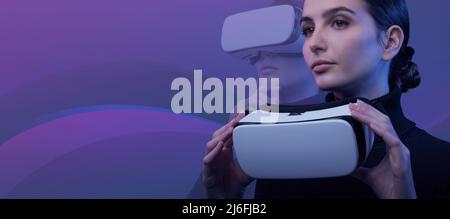 Young woman holding a VR headset and accessing virtual reality, abstract waves in the background, metaverse and immersive virtual reality concept Stock Photo