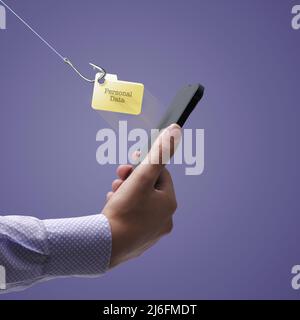 Personal data theft: hacker stealing personal information stored in a user smartphone Stock Photo