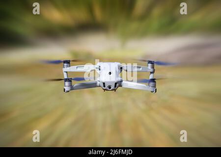 Drone flying very fast with high speed zoom effect. Stock Photo