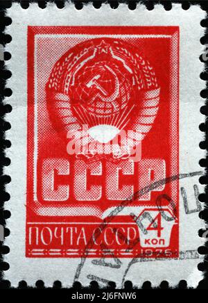 Emblem of the ussr on old russian postage stamp Stock Photo