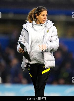 Chelsea assistant coach Denise Reddy oversees the warm up prior to kick ...