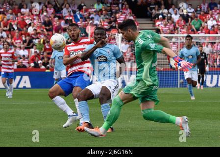 Matias Ezequiel Dituro of RC Celta clears the ball against Joseph Aidoo of RC Celta and Luis Suarez of Granada CF during the Liga match between Granada CF and RC Celta at Nuevo Los Carmenes Stadium on  May 1, 2022 in Granada, Spain (Photo by José M Baldomero / Pacific Press) Stock Photo