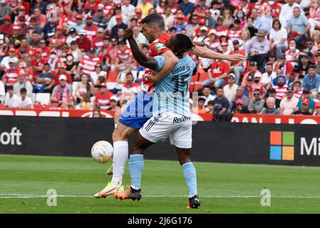 Jorge Molina of Granada CF competes for the ball with Joseph Aidoo of RC Celta during the Liga match between Granada CF and RC Celta at Nuevo Los Carmenes Stadium on  May 1, 2022 in Granada, Spain (Photo by José M Baldomero / Pacific Press) Stock Photo