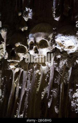 Close-up of human skulls and bones in the Chapel of Bones, Evora, Portugal, Europe. Stock Photo