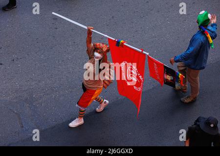 Worker’s Union demonstrator holds a flag during the demonstration. The Worker’s Union group held a parade on Labor Day in Bangkok, Thailand. The parade was joined by various groups such as; Thai Workers group, Myanmar workers group, and pro-democracy group. They gathered at Ratchaprosong Road then marched to Pathumwan intersection, Demonstrators demanded for welfare, fair rate payment, and also democracy (included Thailand and Myanmar). (Photo by Varuth Pongsapipatt / SOPA Images/Sipa USA) Stock Photo