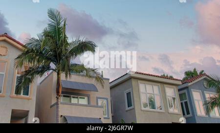 Panorama Puffy clouds at sunset Two-storey residential buildings with modern mediterranean desig Stock Photo