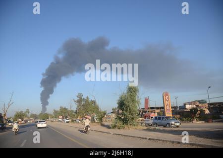 Firefighters try to extinguish the fire broke out at an oil tanker ...