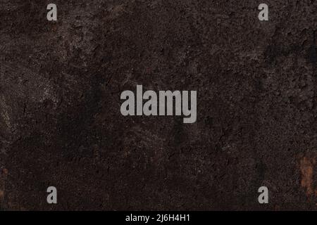 Dark brown bumpy rough surface, iron background with rust. High quality photo Stock Photo
