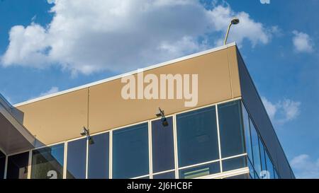 Panorama White puffy clouds Building with ip dome security camera at the corner top Stock Photo