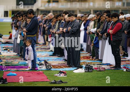 People take part in Eid Prayer during Sunnah as they pray outdoors at Bristol's Big Eid Salah: Eid al- Fitr 2022, as the holy month of Ramadan comes to an end and Muslims celebrate Eid al-Fitr. Picture date: Monday May 2, 2022. Stock Photo