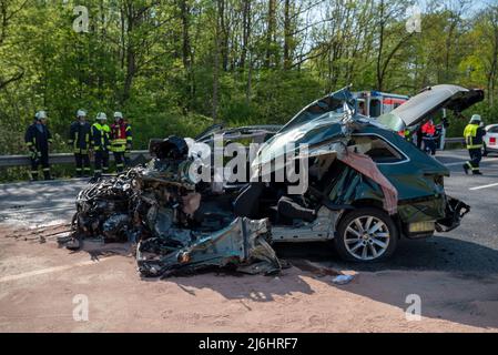 02 May 2022, Rhineland-Palatinate, Newel: A car was totally destroyed in a collision with a truck on the B51 between Newel and Hohensonne (Trier-Saarburg district). The driver of the car was seriously injured. The course of the accident is not yet known, the federal highway was completely closed at the accident site. Photo: Harald Tittel/dpa Stock Photo