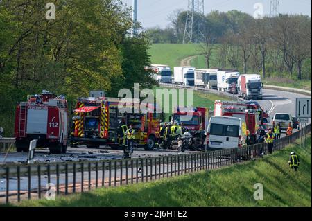 02 May 2022, Rhineland-Palatinate, Newel: A car was totally destroyed in a collision with a truck on the B51 between Newel and Hohensonne (Trier-Saarburg district). The driver of the car was seriously injured. The course of the accident is not yet known, the federal highway was completely closed at the accident site. Photo: Harald Tittel/dpa - ATTENTION: License plate pixelated Stock Photo