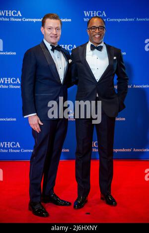 Nick Schmit, left, and Jonathan Capehart arrives for the 2022 White House  Correspondents Association Annual Dinner