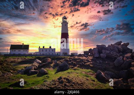 Portland Bill Lighthouse is a functioning lighthouse at Portland Bill, on the Isle of Portland, Dorset, England. Stock Photo