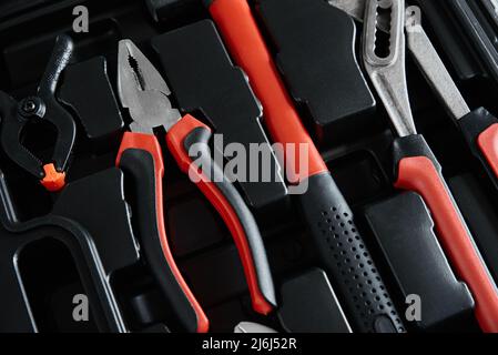 Set of tools for repair and maintenance on black background Stock Photo