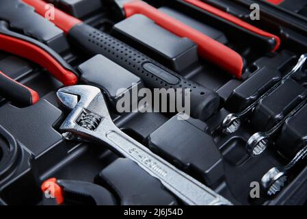Set of tools for repair and maintenance on black background Stock Photo