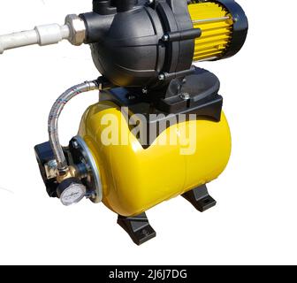New pumping station of water supply, household automatic station. Isolated on a white background. Iron pump housing, pressure sensor, yellow. Stock Photo