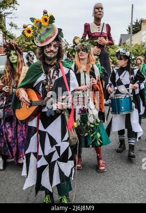 Hastings East Sussex 02 May 2022 Jack is a traditional May Day character symbolizing winter and is at the heart of the Jack in the Green festivities. A towering Jack leads the procession through the ancient lanes of Hastings old town flanked by his green bogies and the event has become part of Hastings history. Paul Quezada-Neiman/Alamy Live News Stock Photo