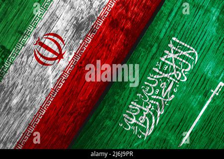 Flags of Iran and Saudi Arabia on the boards. Stock Photo