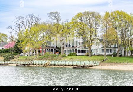 Image from the water of a section old waterfront homes in the Heights Stock Photo
