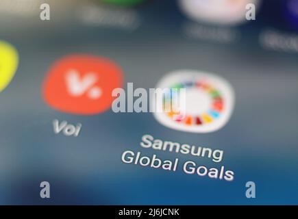 Different mobile applications in a mobile phone, Samsung Global Goals. Stock Photo