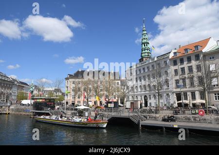 Copenhagen/Denmark/.02 May2022/.Tourist ready for   canal boat cruise in l Copenhagen. channel in danish capital.(Photo..Francis Dean/Dean Pictures) Stock Photo