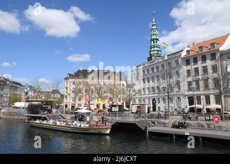 Copenhagen/Denmark/.02 May2022/.Tourist ready for   canal boat cruise in l Copenhagen. channel in danish capital.(Photo..Francis Dean/Dean Pictures) Stock Photo