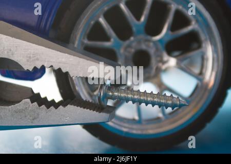 Repair a car concept. Stubbing wheels Stock Photo