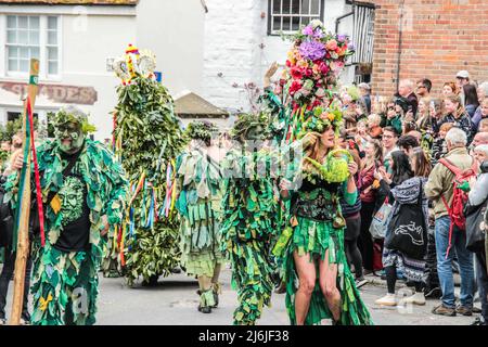 Hastings East Sussex 02 May 2022 Jack is a traditional May Day character symbolizing winter and is at the heart of the Jack in the Green festivities. Taking a little refreshment namely beer .Paul Quezada-Neiman/Alamy Live News Stock Photo