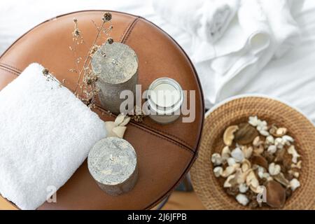 Spa composition with candles and towel, top view. Stock Photo