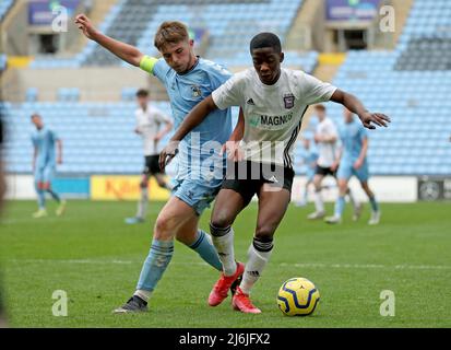 Coventry’s Callum Perry battles for the ball Ipswich’s Afi Adebayo during the Premier League Development Cup Final at the Coventry Building Society Arena, Coventry. Picture date: Monday May 2, 2022. Stock Photo