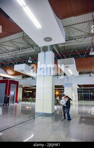 Aktau, Kazakhstan - May 21, 2012: Aktau international airport. Passengers in modern terminal interior Stock Photo