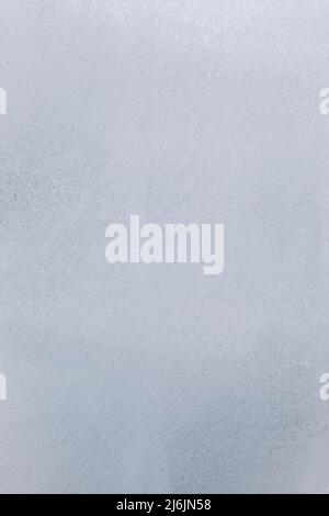 Frost patterns on frozen window. frosted glass texture Stock Photo