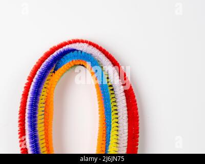 primary color selection of craft pipe cleaners on a white background Stock Photo