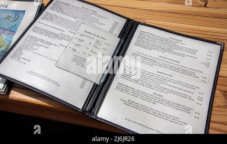 Menus for Nepenthe, a Big Sur landmark on Highway 1 in California. Stock Photo