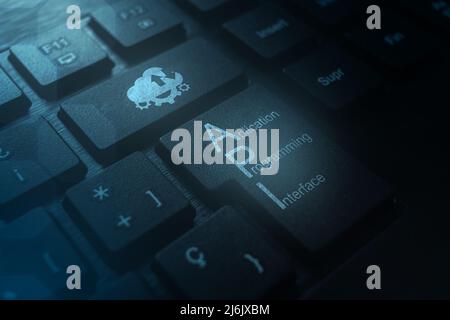 Keyboard with API acronym word icon to push button. Internet and technology concept. Business, programming, interface, application and network. Stock Photo