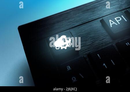 Keyboard with API acronym word icon to push button. Internet and technology concept. Business, programming, interface, application and network. Stock Photo