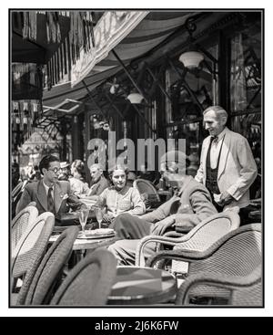 PARIS CAFE RETRO 1940s Post WW2 War freedom optimism with students from the University of Paris (Sorbonne) enjoying their freedom on an alfresco stylish Parisian Cafe Restaurant terrace in Paris, with traditional Parisian waiter Date : 1948 Post War Location : France, Paris  Photographer : Willem van de Poll Stock Photo