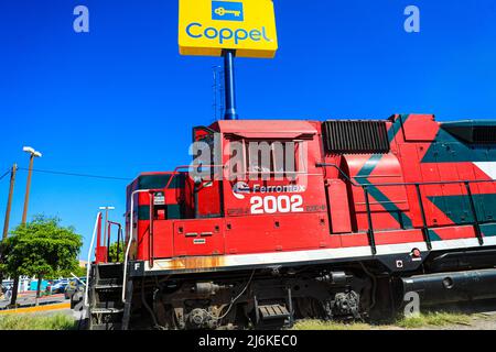 Feromex company train passing through Navojoa, Sonora Mexico. Mexican transport, Mexican railways, the largest railway network in Mexico with 11,000 km of track, covering the main industrial and consumer areas of the country. Stock Photo