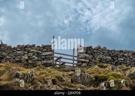"Hole in the wall"  waypoint on the footpath to Helvellyn in the English Lake District, Cumbria, England, UK Stock Photo