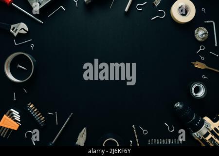 Many different tools for repair work on a black background with copy space for text Stock Photo