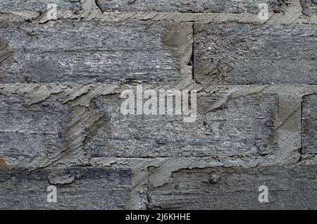 texture of a wall made of concrete blocks, bricks, gray color, background, wallpaper for projects Stock Photo