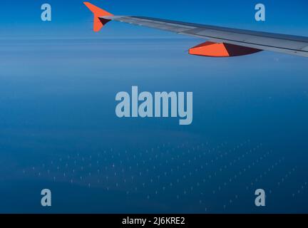 Photo of the London Array wind farm in Kent, taken from an aircraft including the aircraft wing Stock Photo