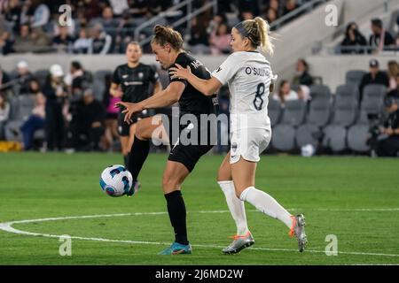 Angel City FC midfielder Savannah McCaskill (9) controls the ball as North Carolina Courage midfielder Denise O’Sullivan (8) defends during a NWSL mat Stock Photo