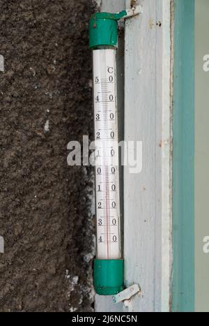 outdoor thermometer behind the window Stock Photo - Alamy