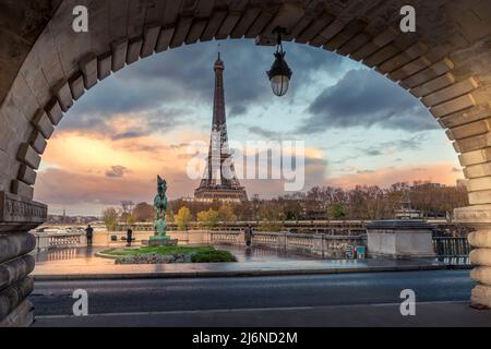 Paris, France - November 19, 2020: Eiffel tower seen from arch of Bir Hakeim bridge in Paris Stock Photo